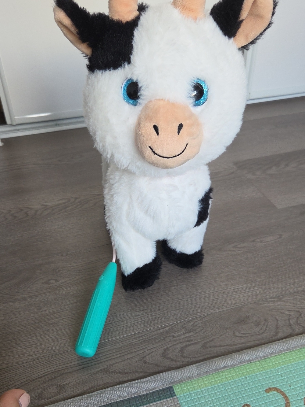 Plush White and Black Cow Toy with Blue Eyes - Interactive Kids Toy